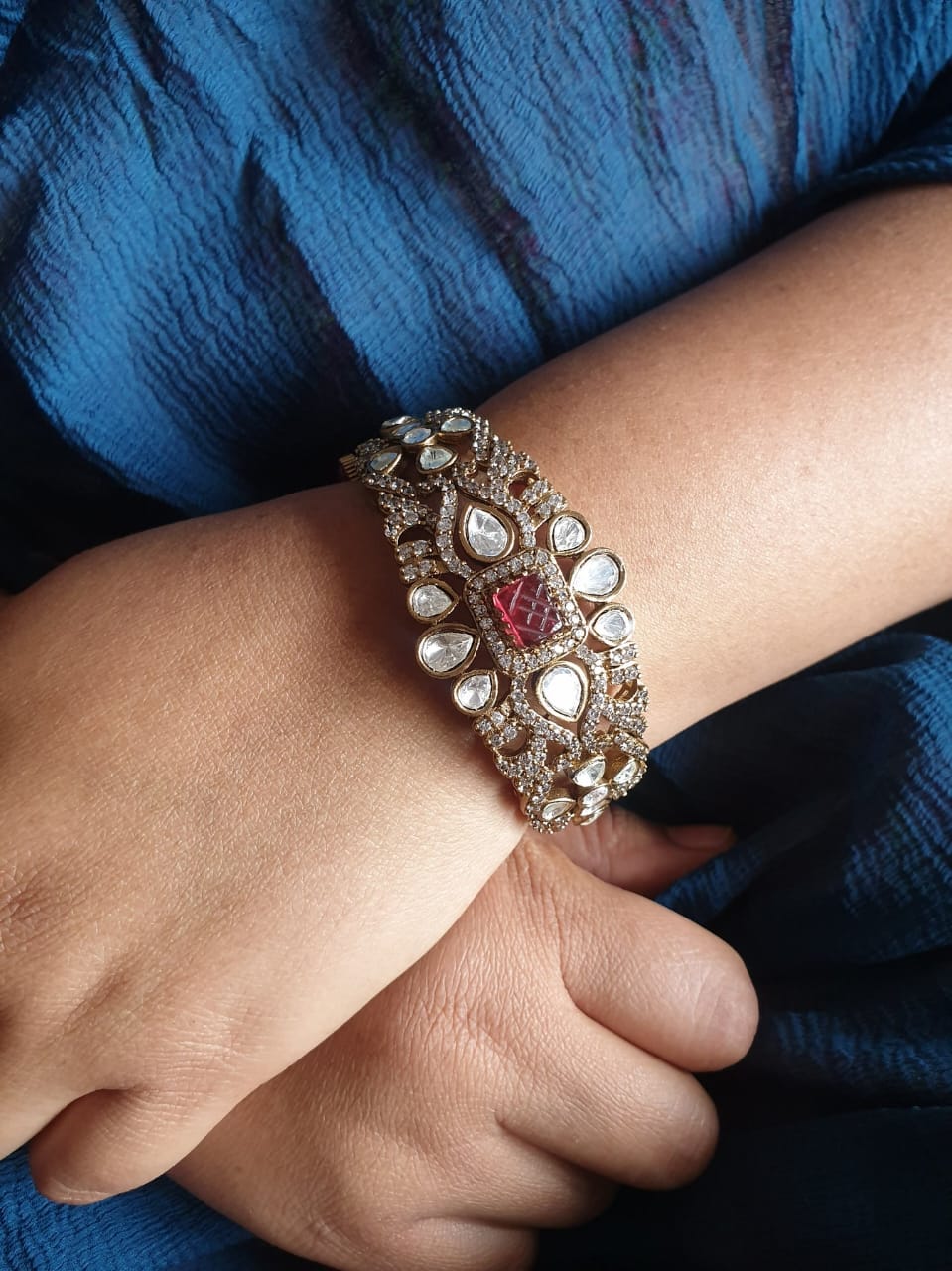 AD Stone Bracelet ruby coloured with Openable system